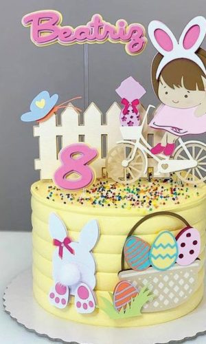 Topo de Bolo Páscoa Menina na Bicicleta Arquivo de Corte